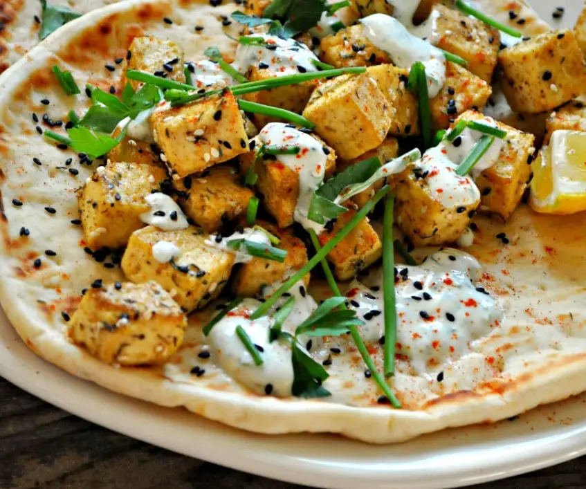 VEGAN ZA’ATAR TOFU WITH HERB YOGHURT SAUCE